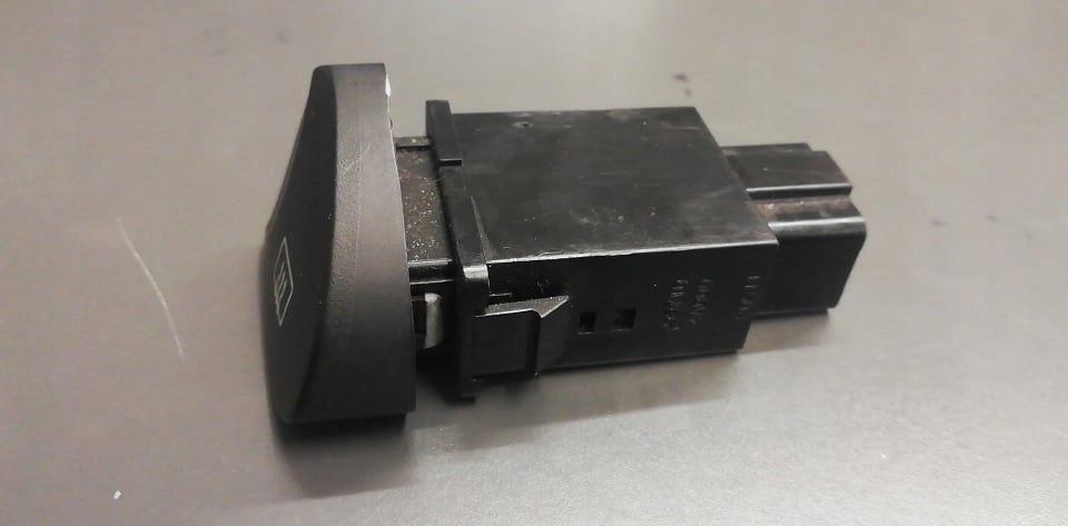 фото №5, Hyundai h1 97- кнопка підігрів скло новий оригінальний номер