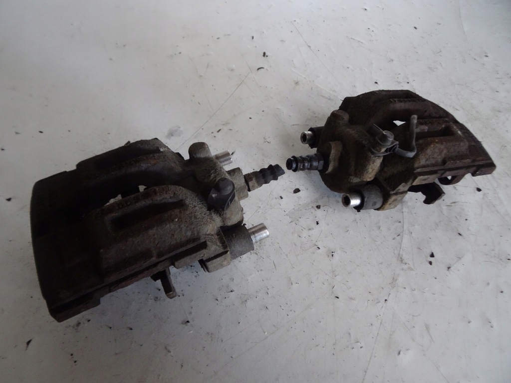 фото №1, Суппорт левый задняя bmw 1