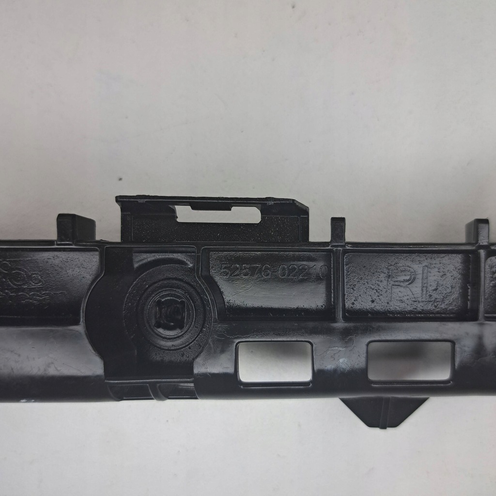 фото №7, Toyota corolla e210 e21 левый кронштейн кронштейн бампера заднего 52576-02210