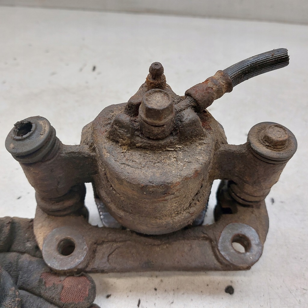 фото №15, Suzuki jimny суппорт тормозной левый перед