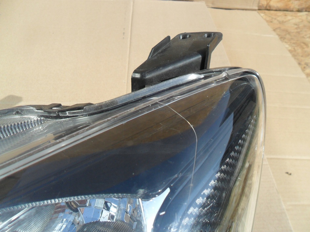 фото №16, Mazda 2 лампа левая обычная