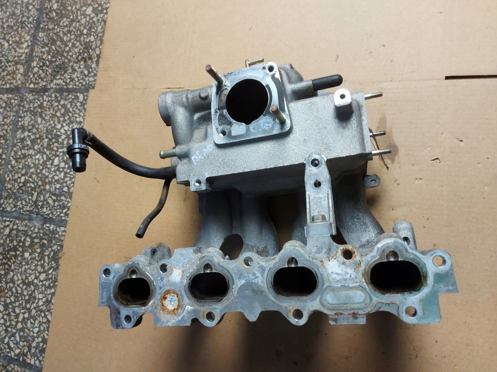 фото №1, Колектор всмоктуючий впускний mazda demio i 1.3 16v оригінальний номер eu