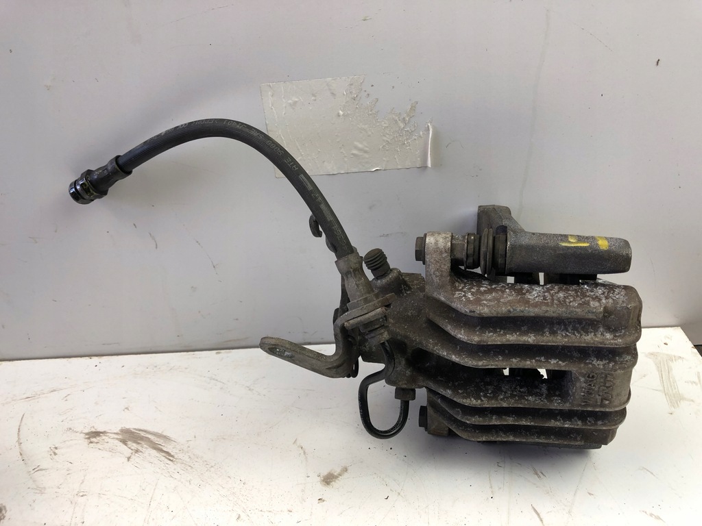 фото №4, Vw golf touran супорт гальмівний trw лівий задня