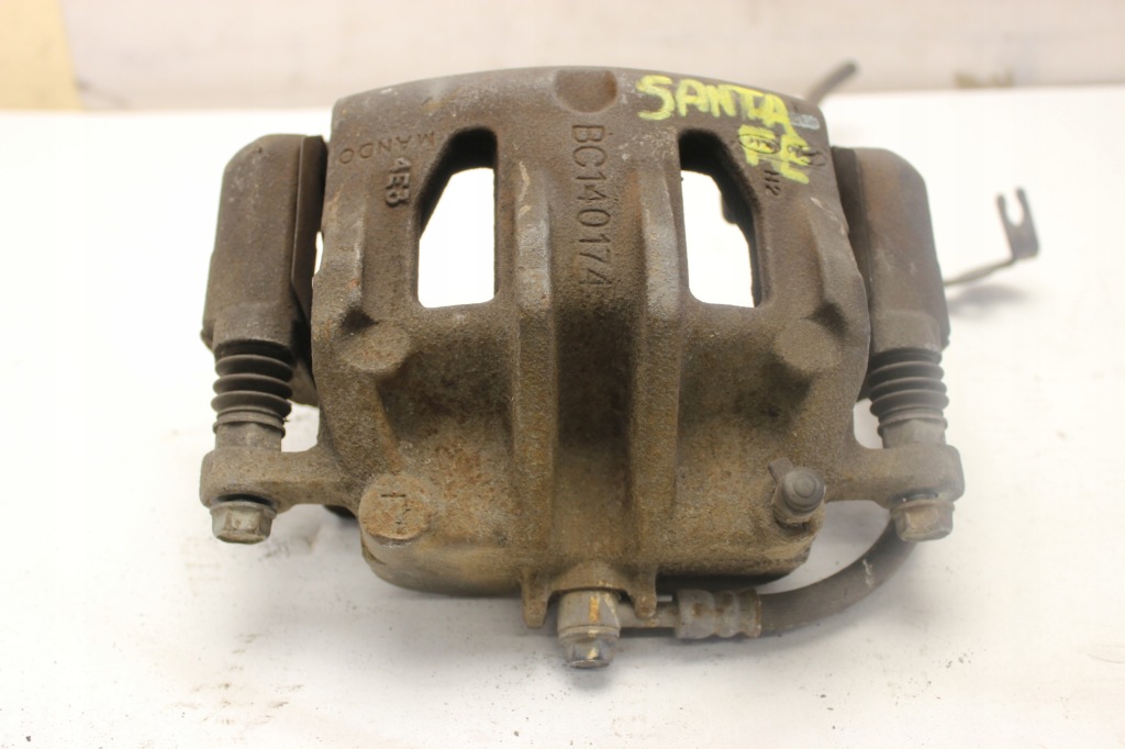 фото №1, Супорт гальмівний лівий перед santa fe iii bc140174