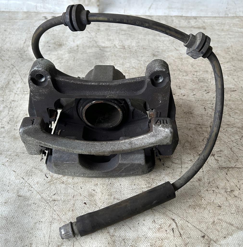 фото №3, Суппорт тормозной левый перед renault espace v