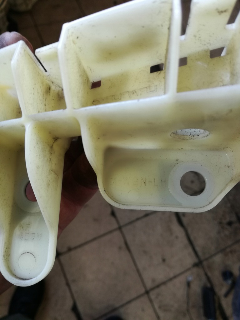 фото №7, Subaru xv 2011 - 2017 rok кронштейн направляющая pod фара левый задняя