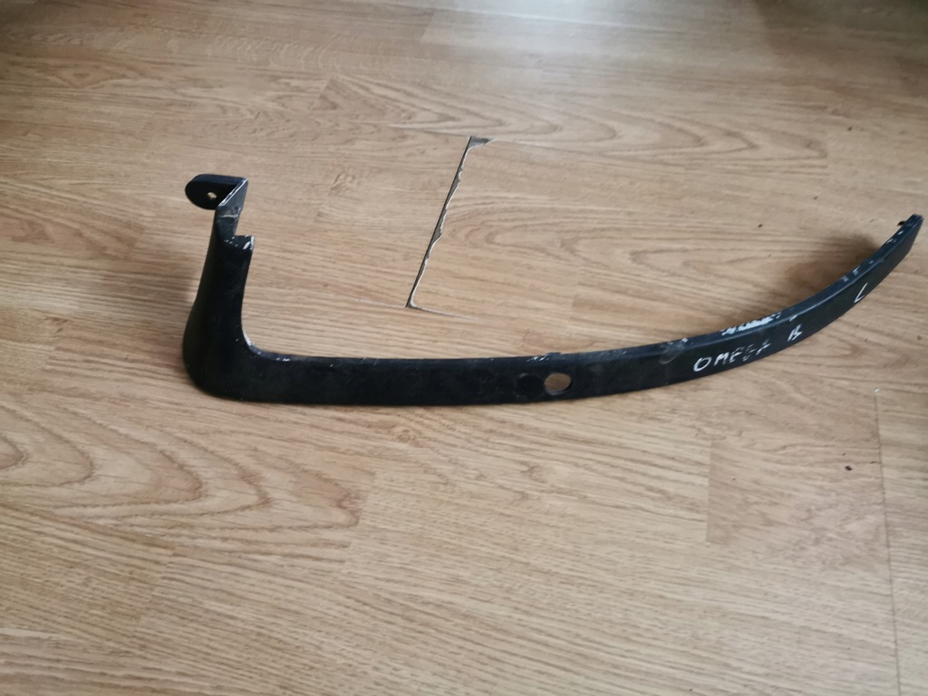 фото №1, Opel omega b молдинг лампы левый перед