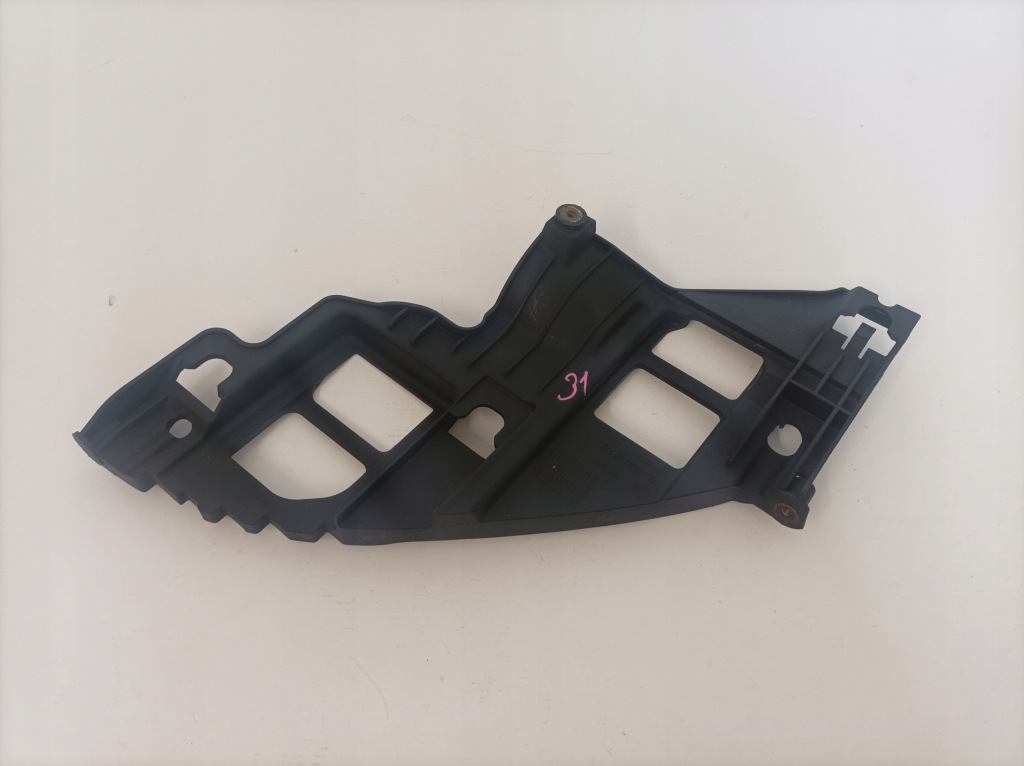 фото №1, Направляющая лампы левый перед vw golf vi 5k0807227a