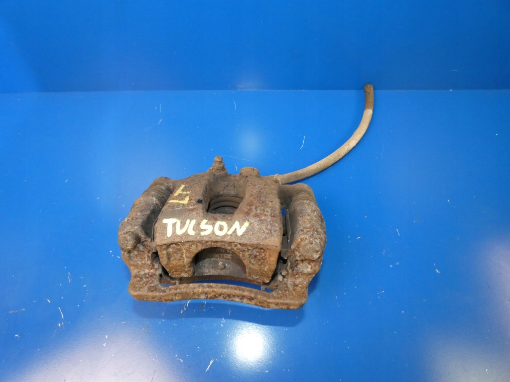 фото №1, Hyundai tucson iii суппорт тормозной левый задняя