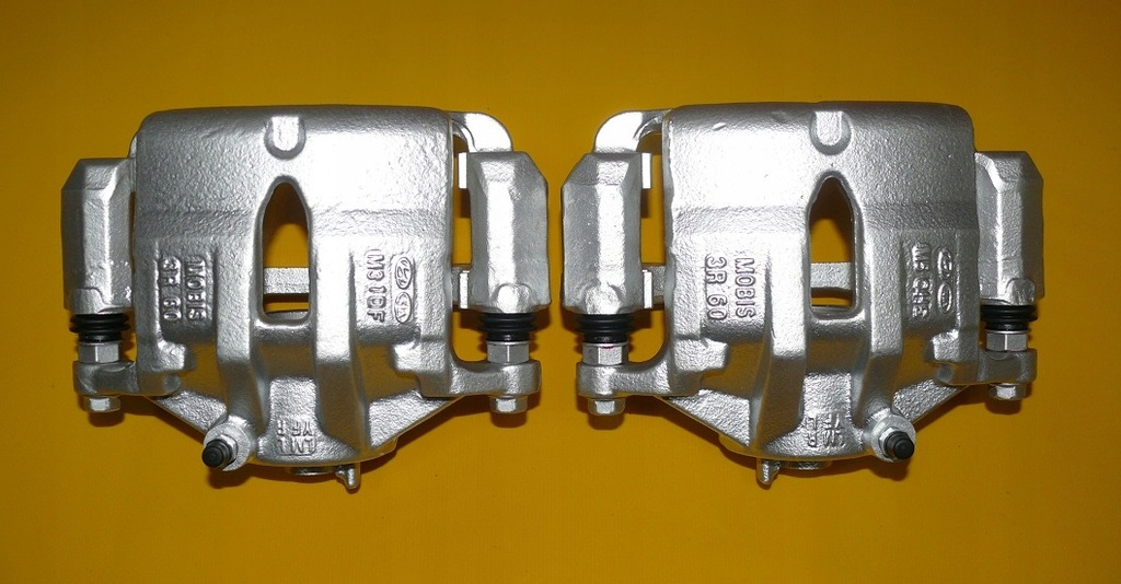 фото №9, Супорти гальмівні скоба лівий правий перед hyunday ix35 ix-35 300/28mm 09-15