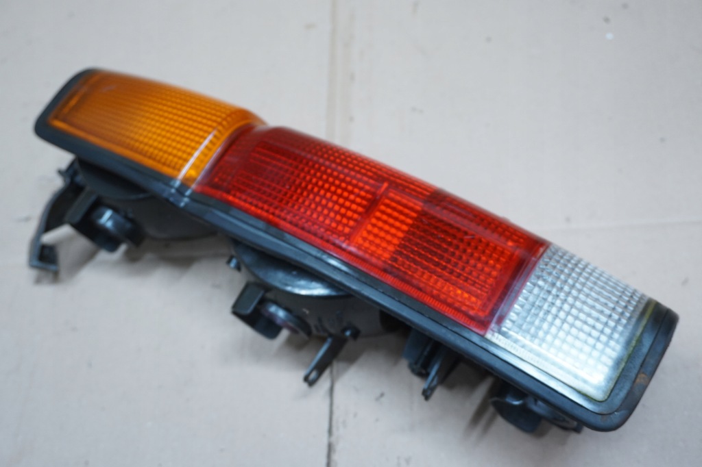 фото №11, Nissan navara d21 king cab лампа лівий задня задня org.