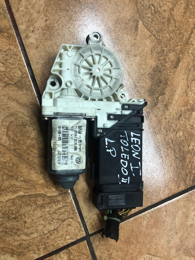 фото №1, Моторчик скло лівий перед leon