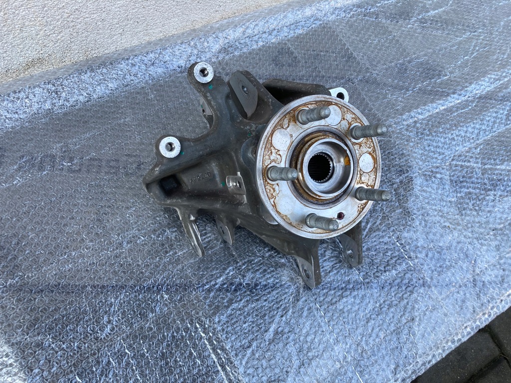 фото №1, Поворотний кулак ліва задня tesla x 1027411-00-d