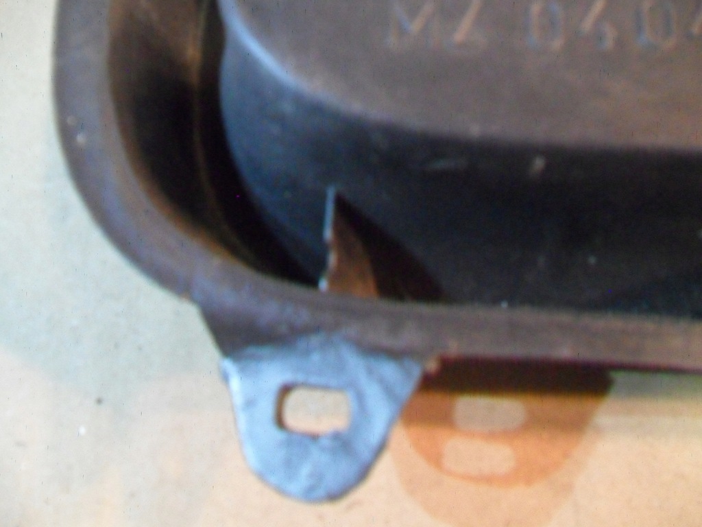 фото №13, Mazda 323 заглушка бампера ліва