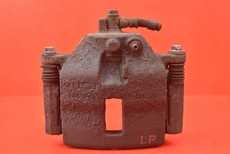 фото №1, Супорт лівий перед nissan primera p12 1.6 16v 02r