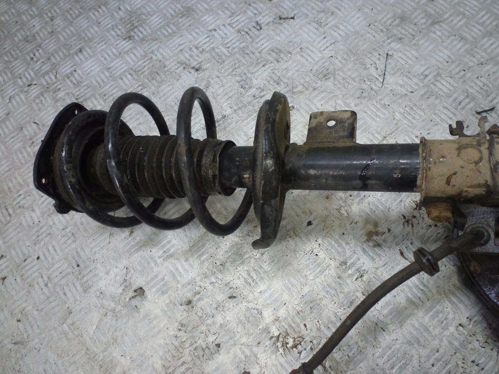 фото №6, Поворотный кулак амортизатор правый перед latitude kpl