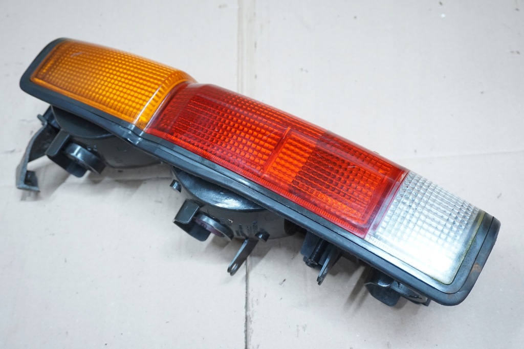 фото №12, Nissan navara d21 king cab лампа лівий задня задня org.