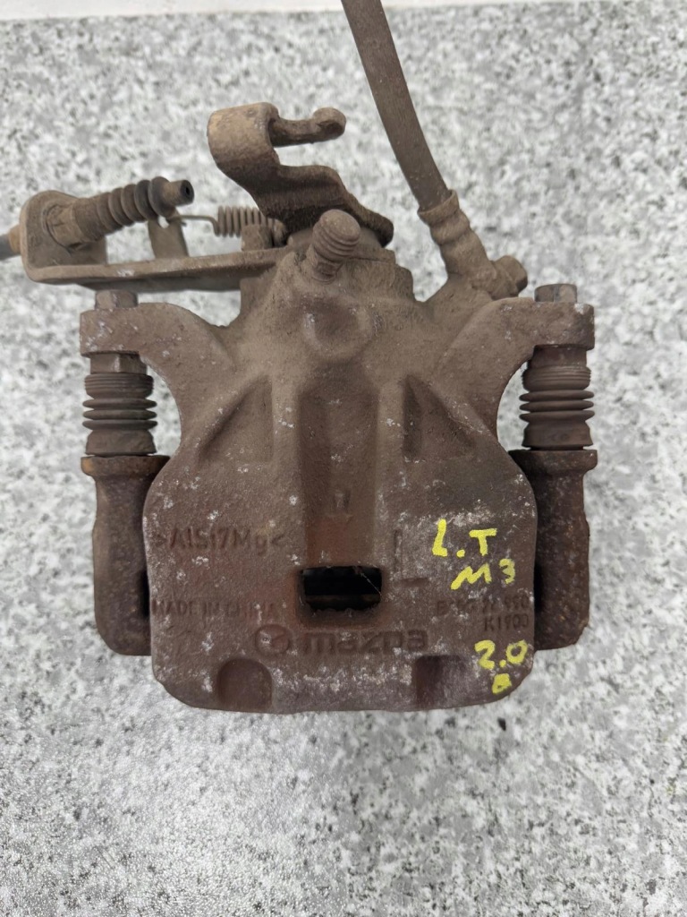 фото №1, Супорт гальмівний лівий задня mazda 3 bm 2013-2017 w-wa