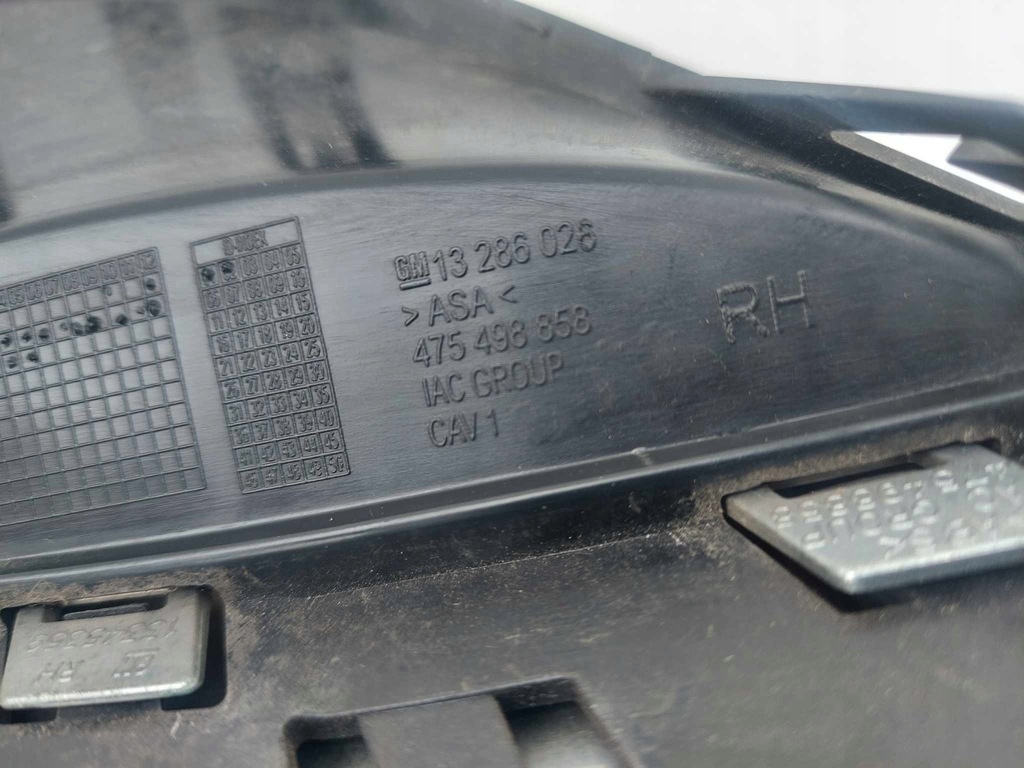 фото №6, Opel оригинальный номер 13286026 решётка бампера противотуманной фары