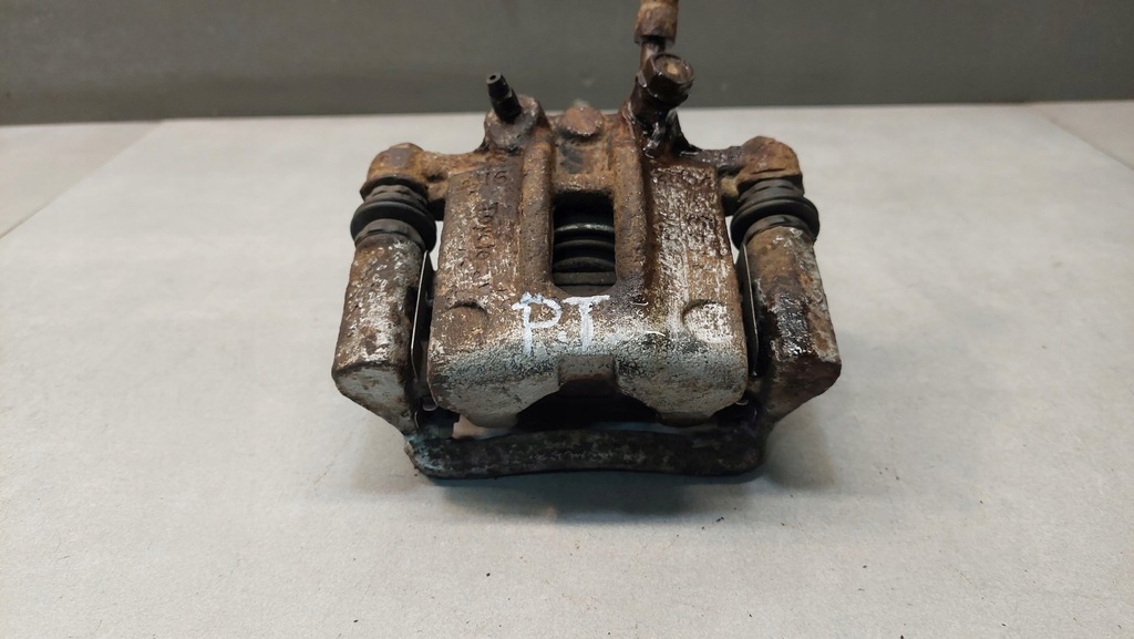 фото №5, Супорт гальмівний правий задня corolla e12 1.4 b