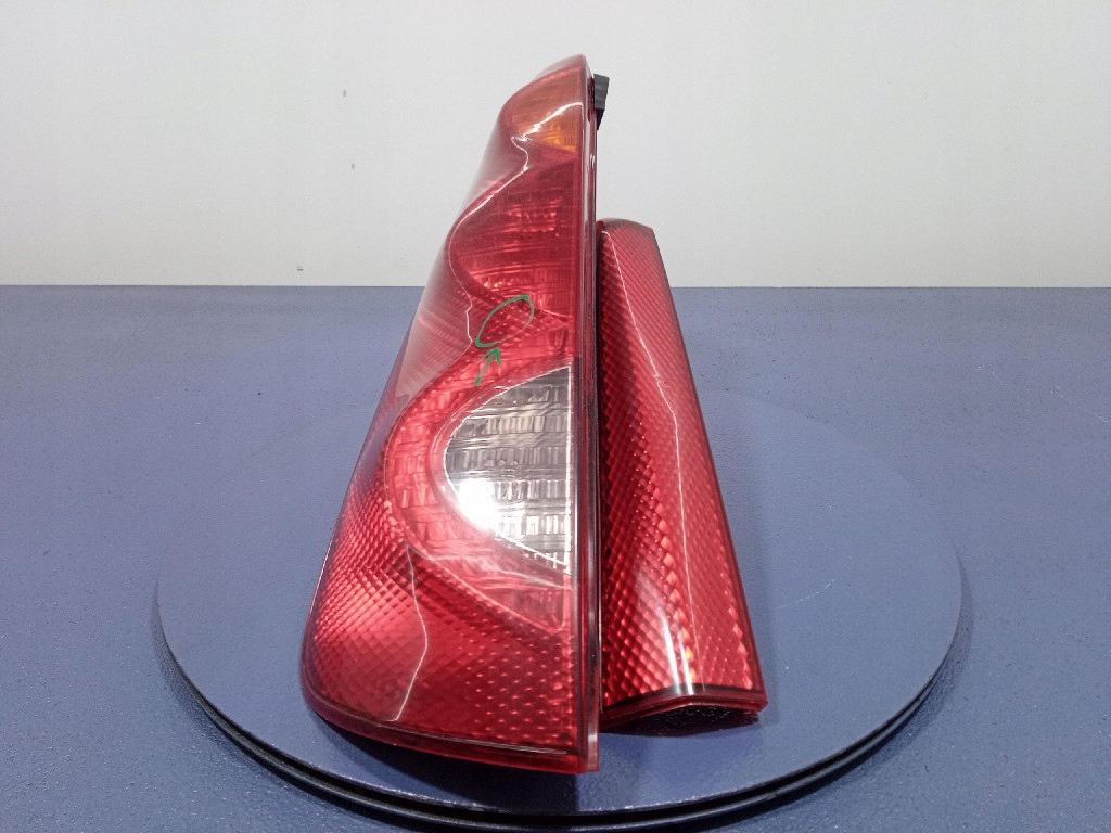 фото №1, Nissan note i e11 05- лампа задня ліва зовнішня 220-16752