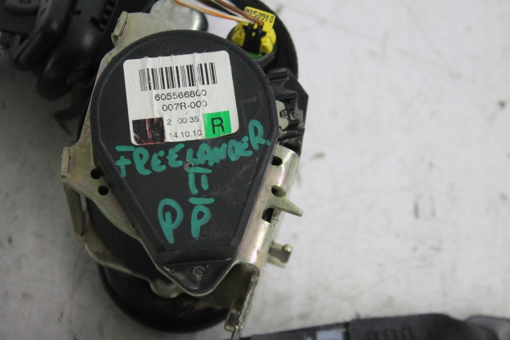 Ремінь натягувач правий перед передній freelander ii Оригінал