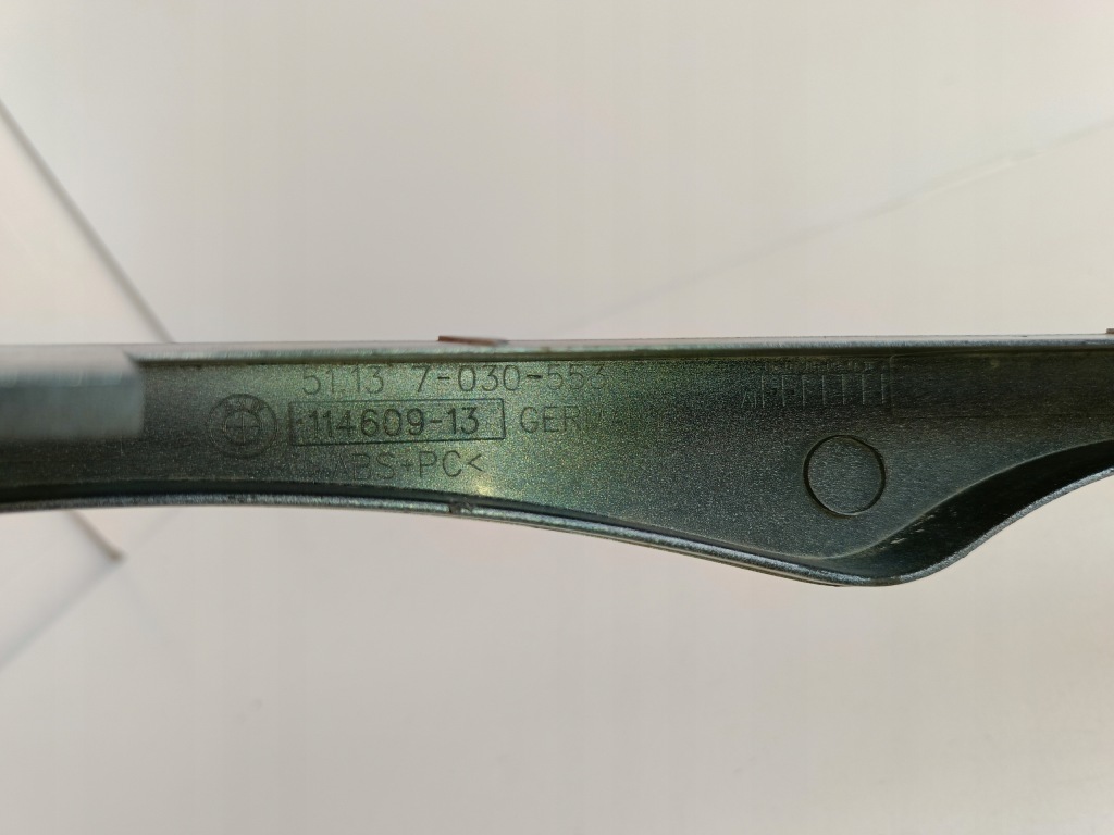 Молдинг під  фара ліва 7030553 bmw e46 Зі Шроту