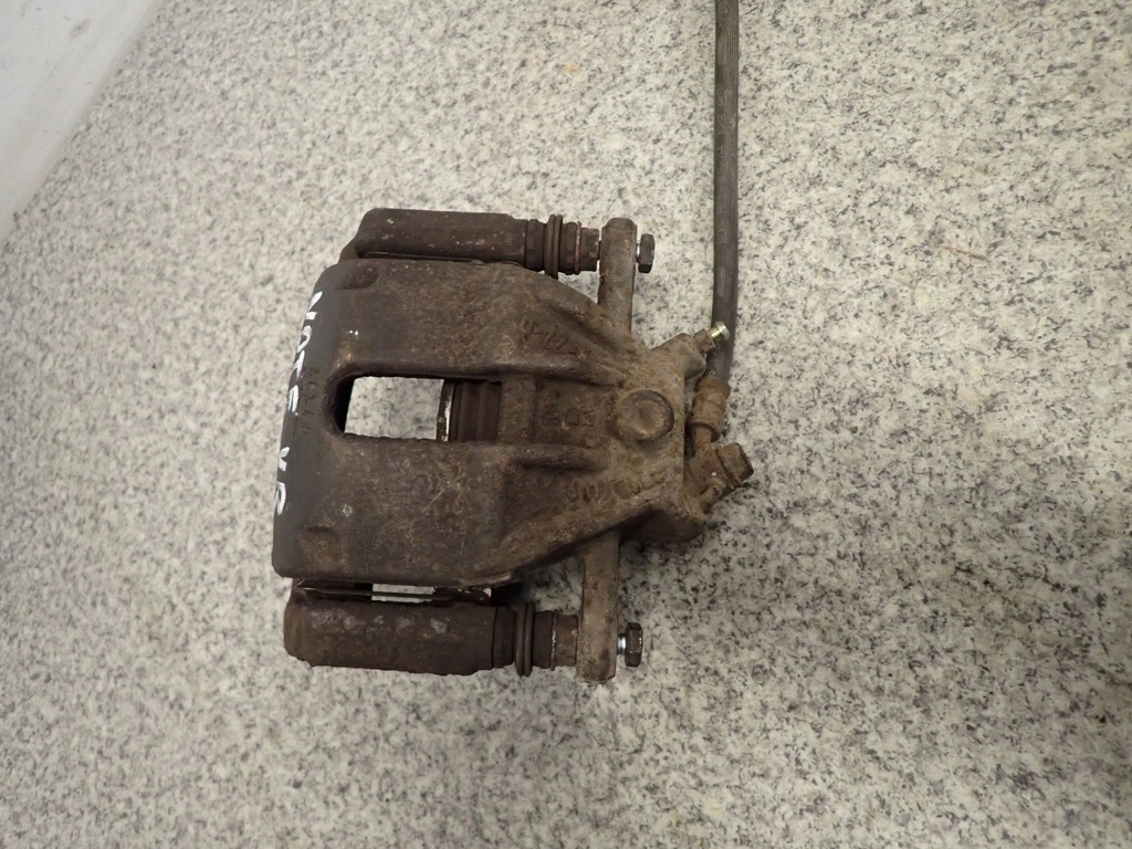 фото №5, Nissan note e11 суппорт тормозной перед правый