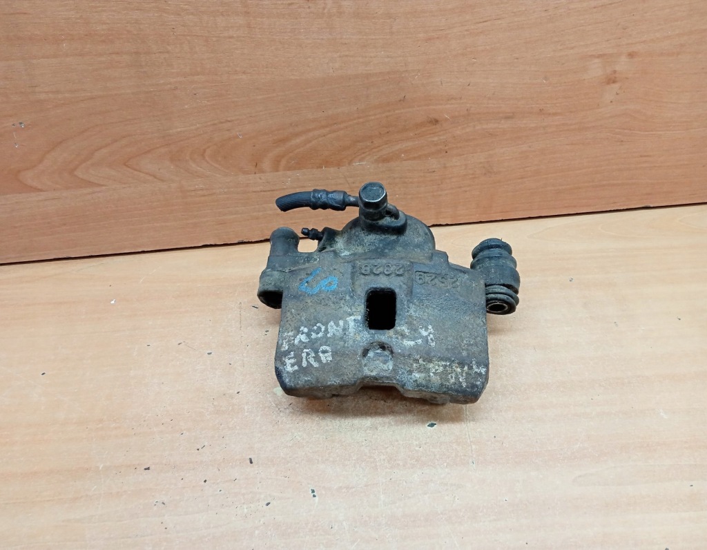 фото №1, Суппорт тормозной левый перед isuzu trooper i 2.8 td