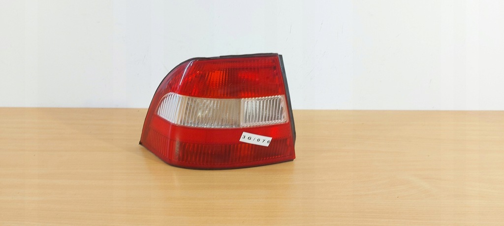 фото №1, Opel vectra b hb sedan ліва лампа задня carello