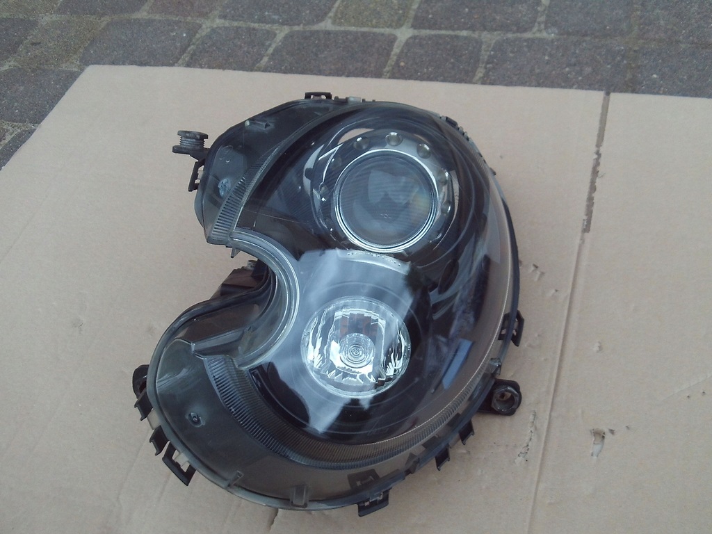 фото №1, Лампа левая bi ксенон некрутящиеся mini cooper r55 r56 0311225279 euro