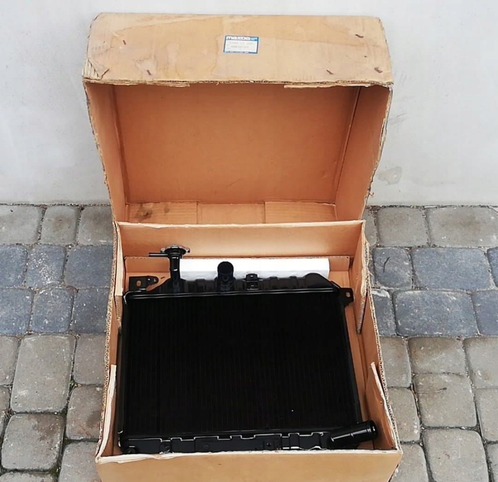 Mazda 323 bd радиатор воды 1.1 1.3 nowa oryg Цена