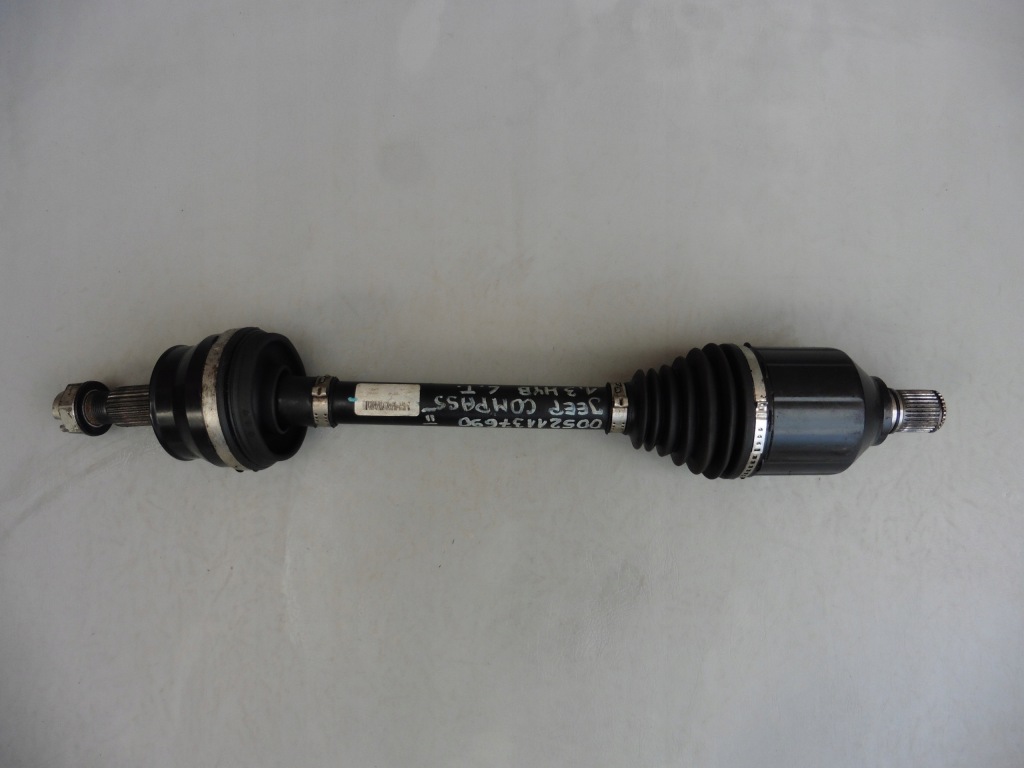 Купить Приводной вал левый задний  jeep compass 2 1,3 гибрид 00521137690