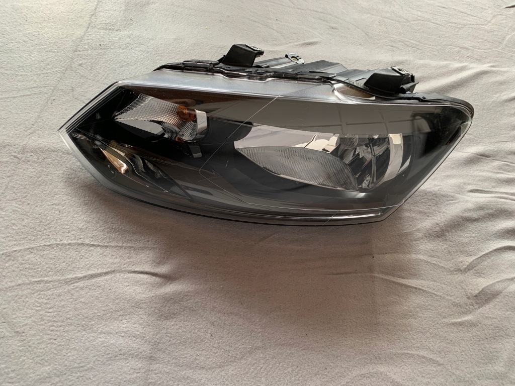 фото №1, Vw polo v 6r0 лампа ліва перед передня nowa oryg.