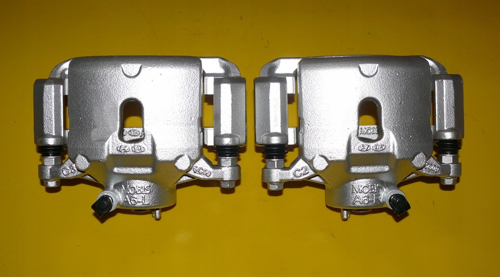 фото №9, Супорти гальмівні скоба лівий правий перед hyundai i30 kia ceed ii 2 300/28