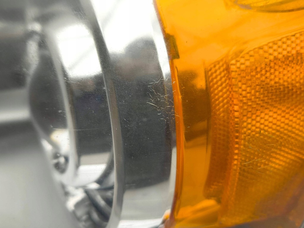 фото №14, Chrysler grand voyager v 2009 ліва сторона лампа передня