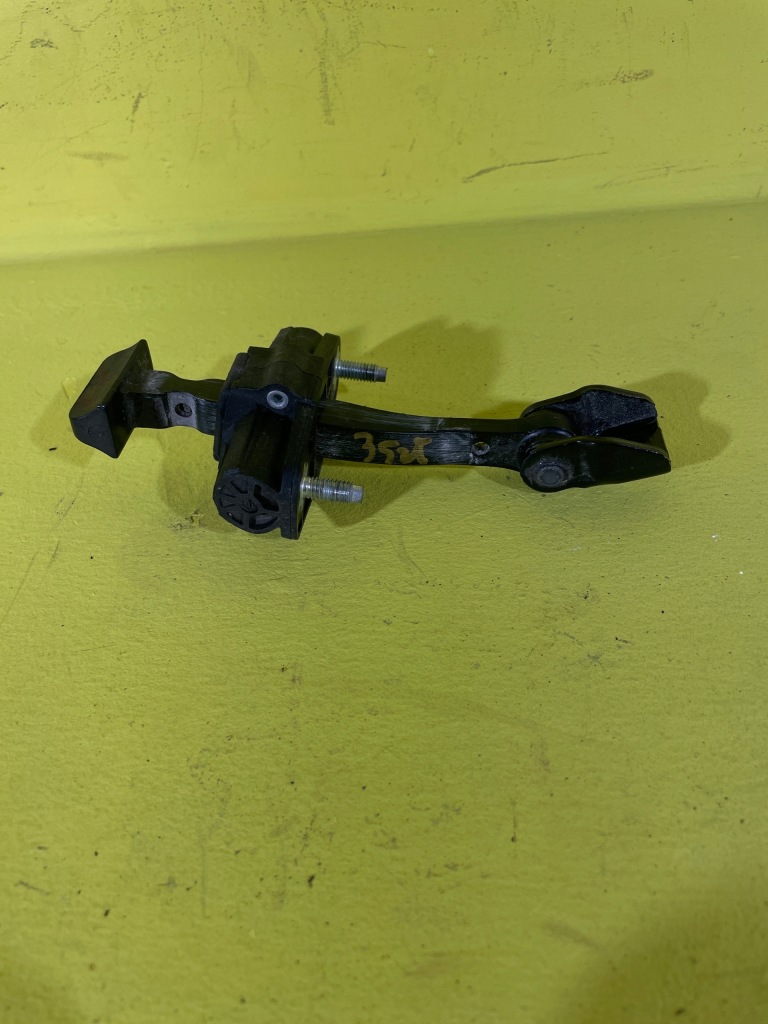 фото №1, Mini countryman r60 - обмежувач двері правий задня