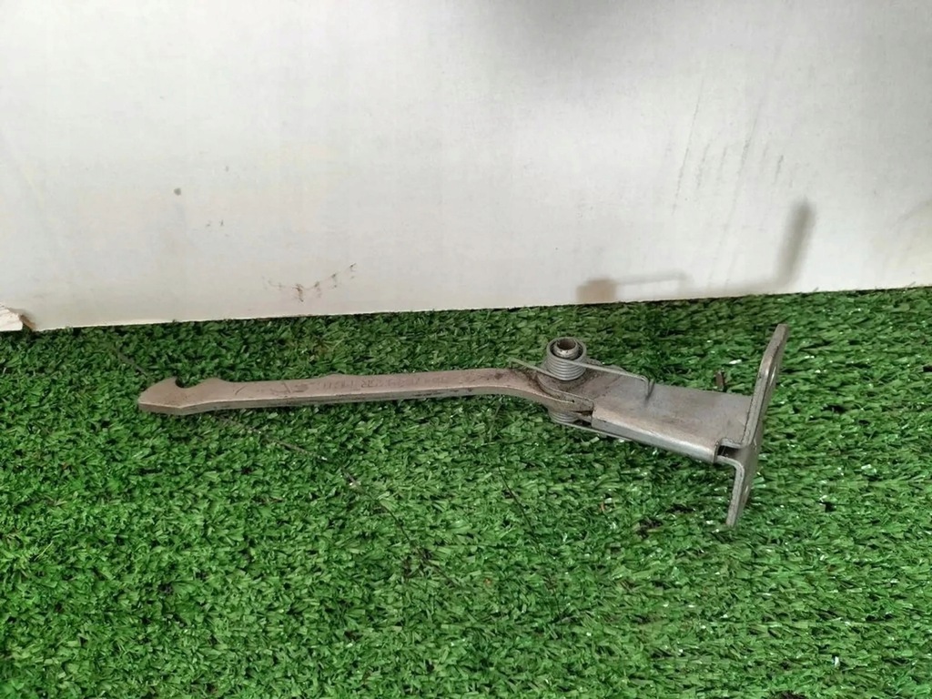 фото №1, Обмежувач двері лівий задня dacia dokker 904704935r