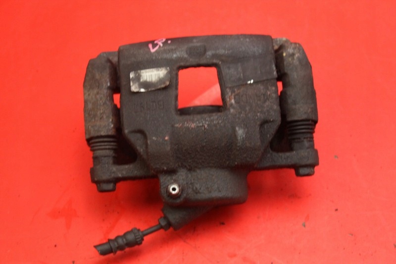 фото №4, Суппорт тормозной левый перед peugeot 301 1.2 vti