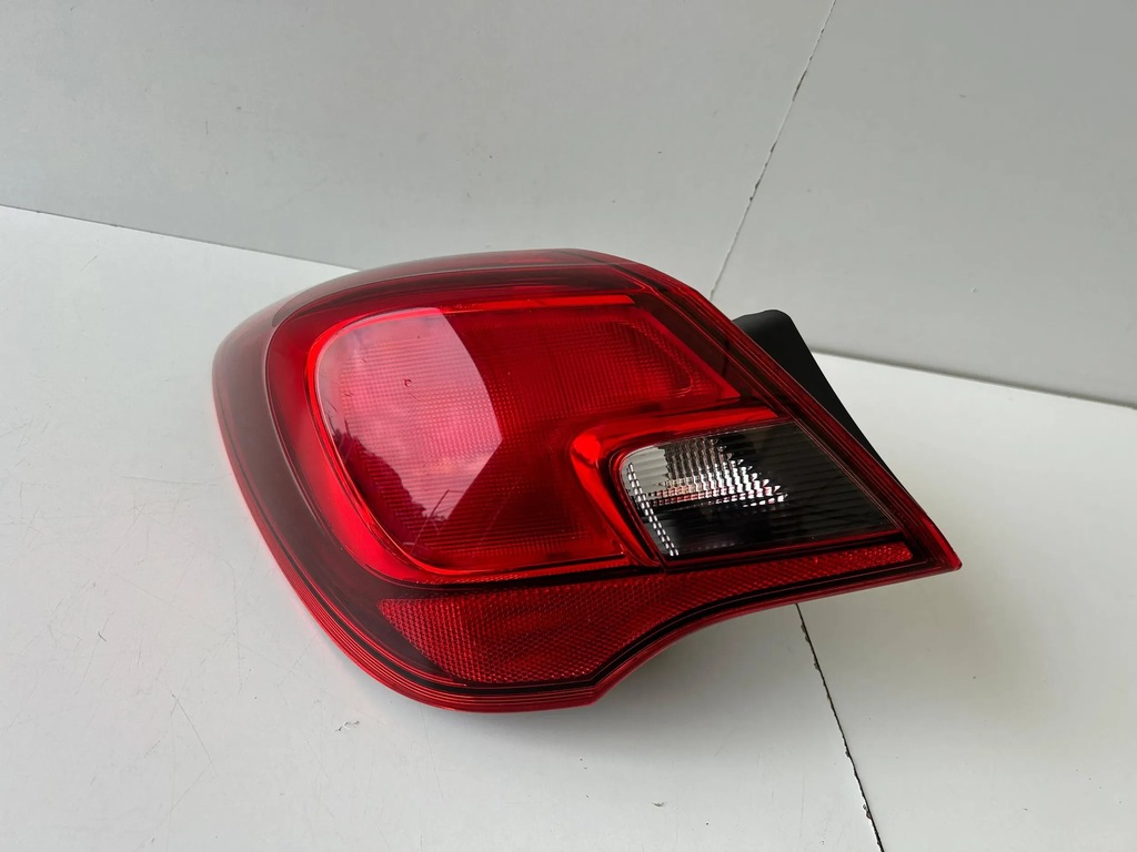 фото №1, Opel corsa e лампа лівий задня 39068625 оригінал