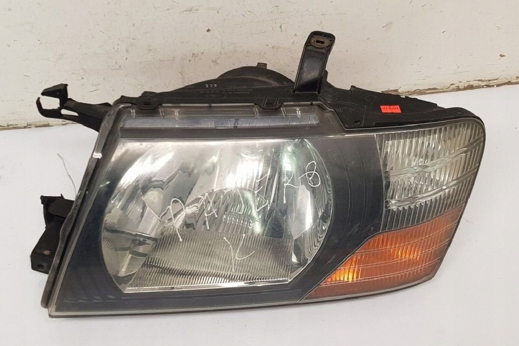 фото №9, Лампа ліва передня mitsubishi pajero iii v7_w, v6_w 10087420 3.2l дизель