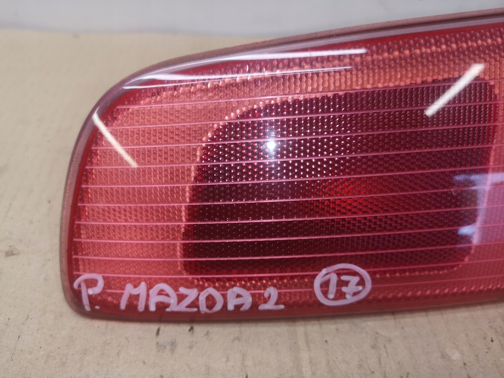 фото №10, Лампа w кришка задня права + ліва mazda ii 2 dy 03-07