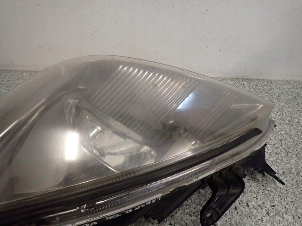 фото №7, Mitsubishi lancer vii 04- лампа передняя левая фара