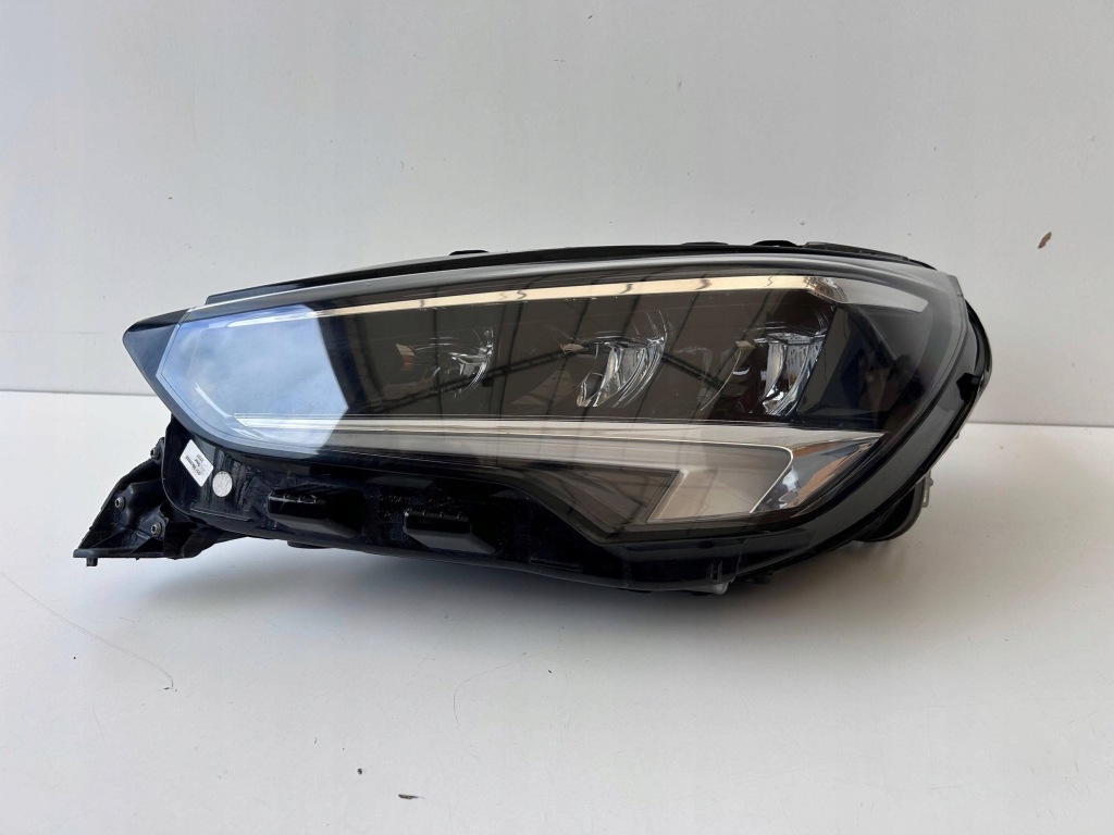 фото №1, Opel corsa f лампа левая перед 9829522780 оригинал