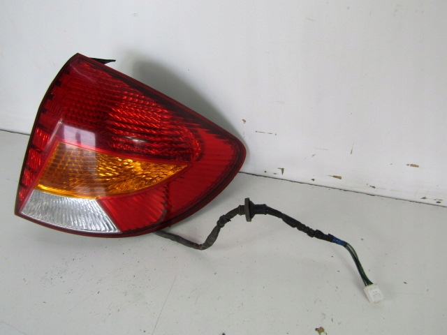 фото №11, Kia rio i dc лампа задняя правая kombi 0k34a5140r + вкладыш ламповый