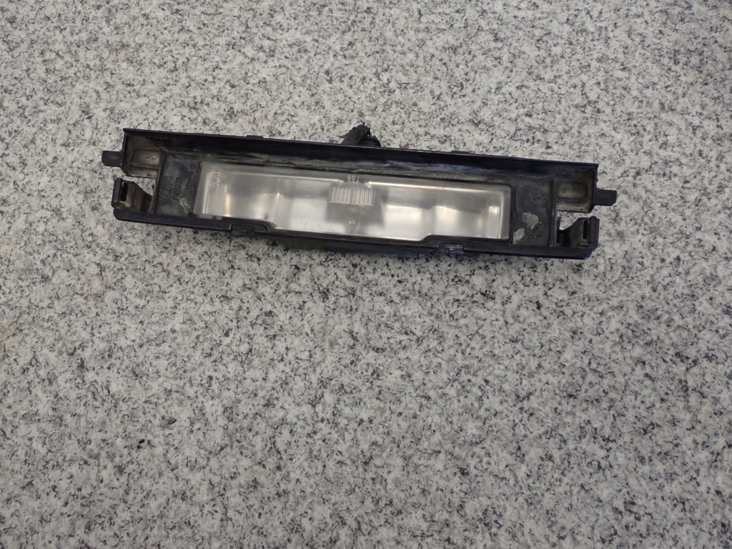 фото №1, Toyota yaris ii 06- лампа номерного знака реєстраційний