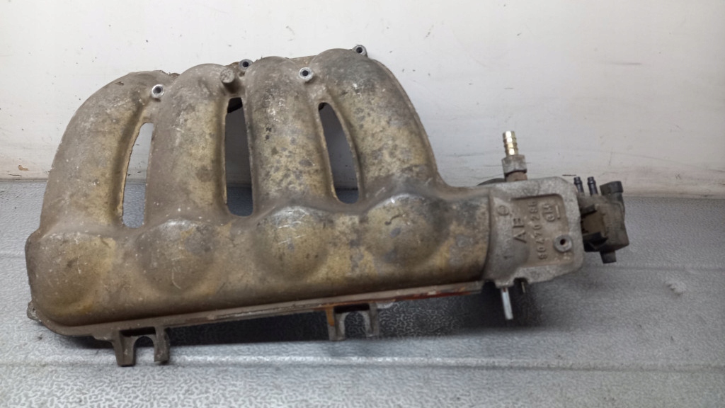 фото №1, Колектор всмоктуючий opel tigra 1.4b 95r 90470295