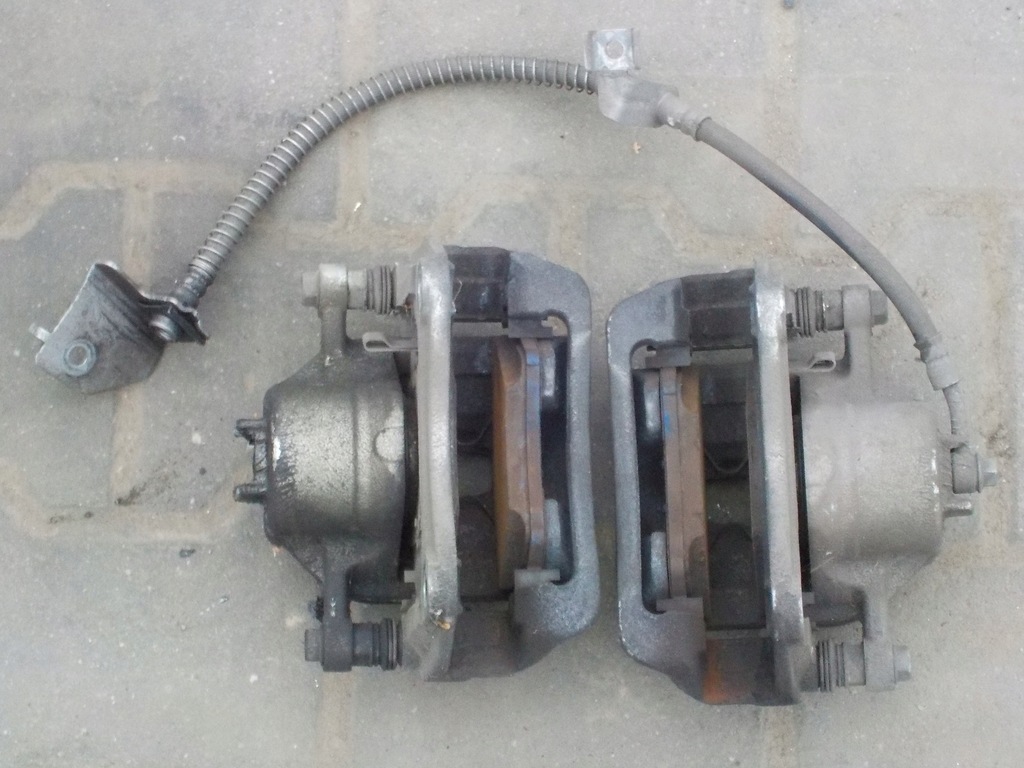 фото №1, Kia stonic 1.2 2017- супорт гальмівний задня задній eu