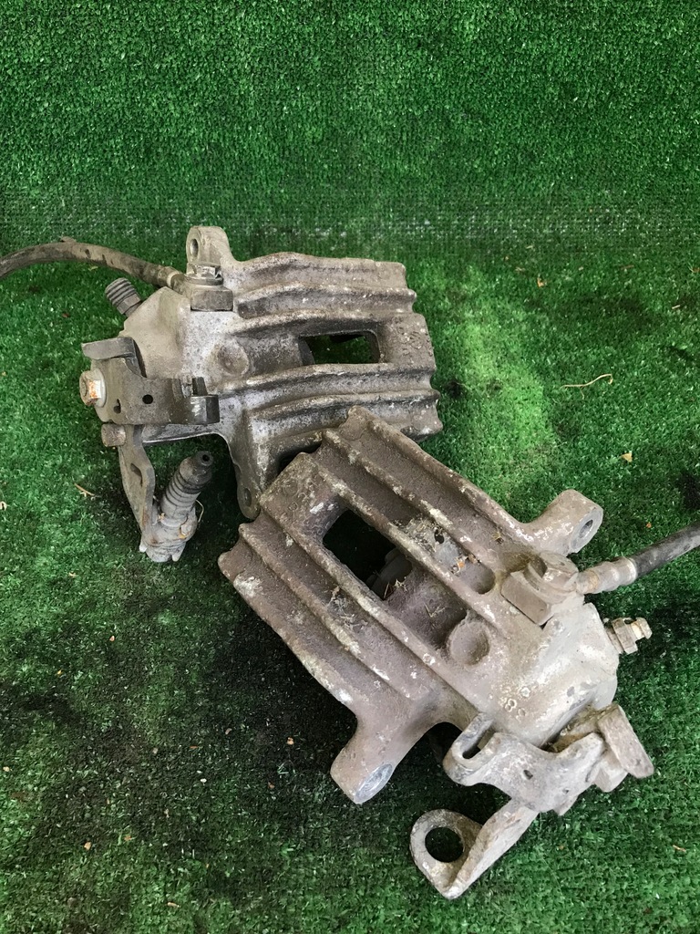 фото №1, Супорт гальмівний задня задній roomster rapid лівий