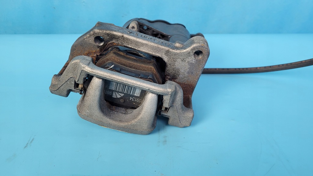 фото №7, Opel astra l vi 23r 1.5d суппорт тормозной левый задняя 9819059380